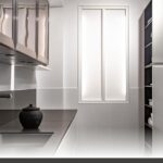 Top Ten Mistakes to Avoid During a Vancouver Island Kitchen Renovation featuring custom shaker-door kitchens with matte white finishes and handles.