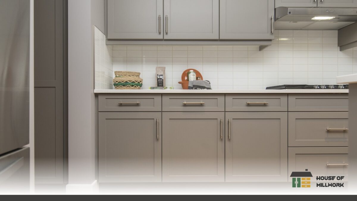 Explore value kitchen cabinets with custom shaker-door style in matte white with handles.