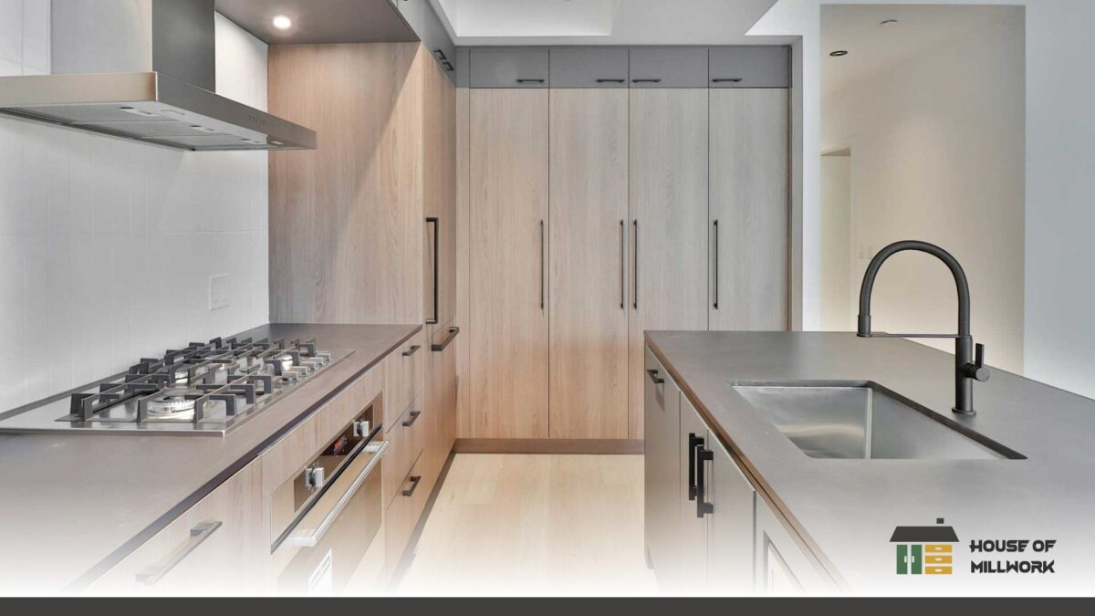 Custom shaker-door kitchen cabinets built to resist coastal humidity and wood movement.