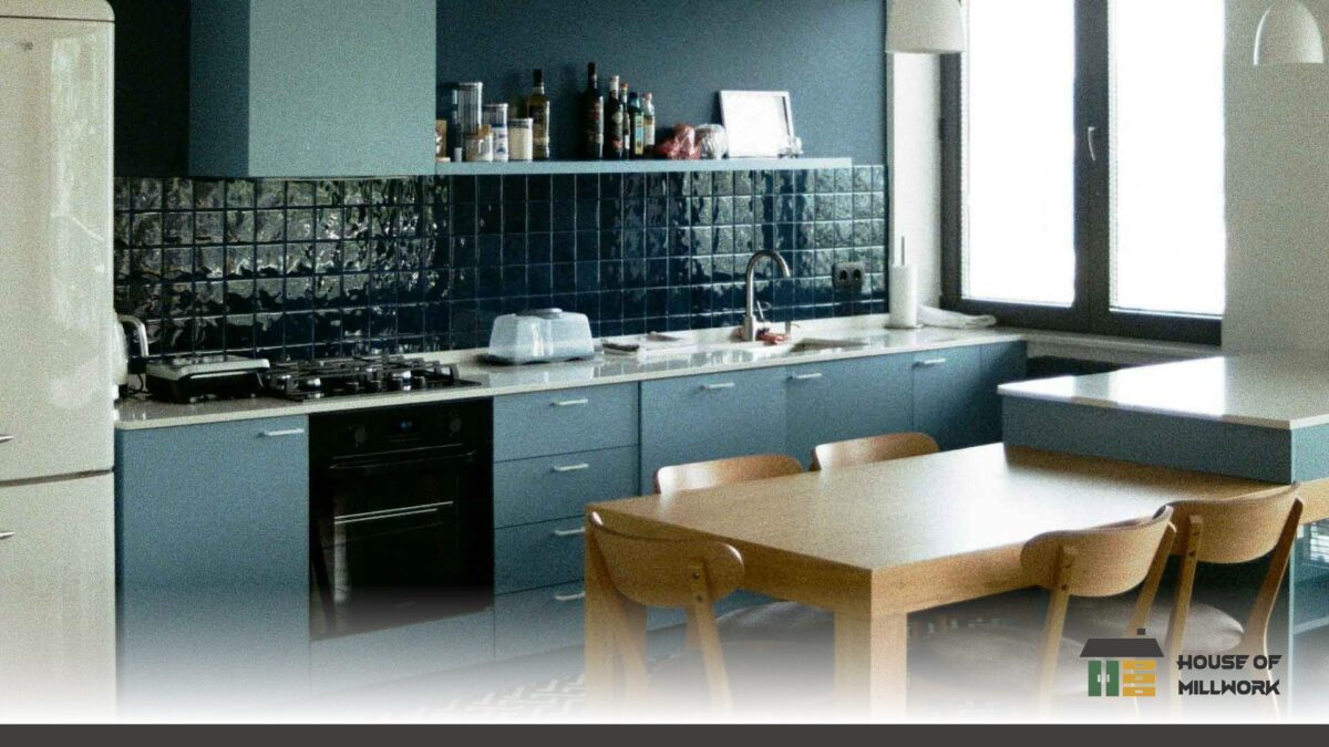 Electrical and plumbing considerations for cabinet installation in a custom shaker-door kitchen with matte white handles.