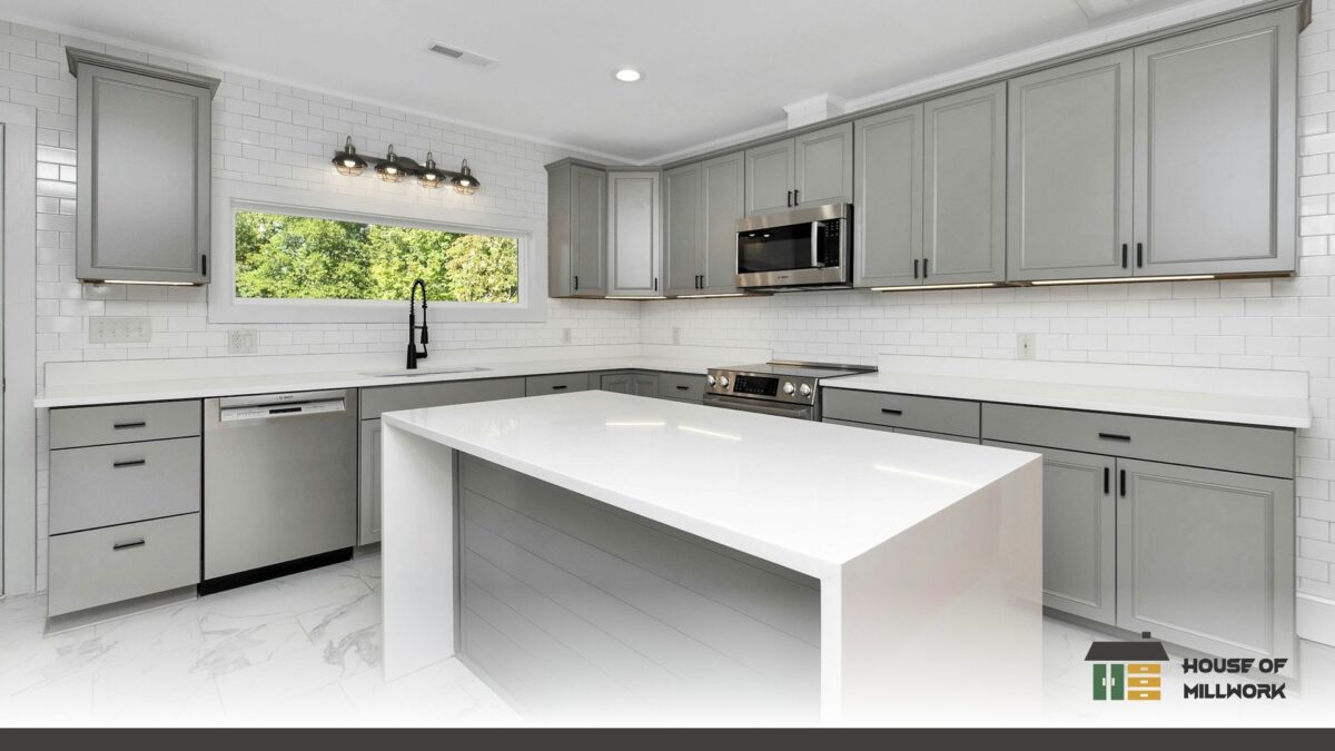 How House of Millwork designs your kitchen featuring a custom matte white shaker-door kitchen with handles.