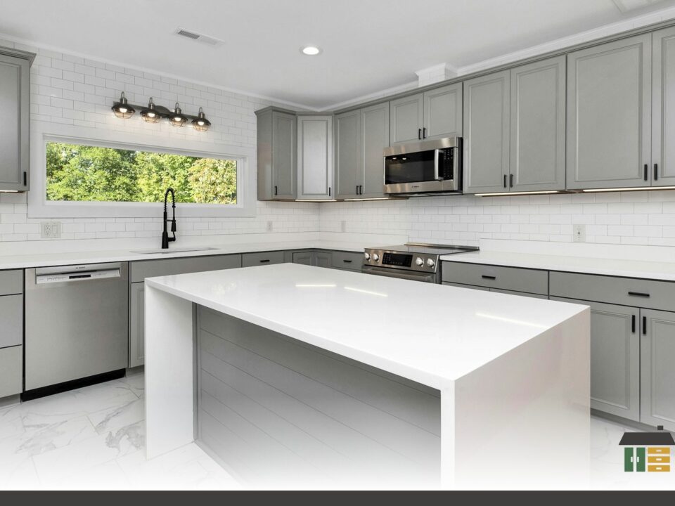 How House of Millwork designs your kitchen featuring a custom matte white shaker-door kitchen with handles.