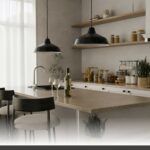 Moisture resistant cabinet solutions featuring custom shaker-door kitchens with matte white finishes and handles.